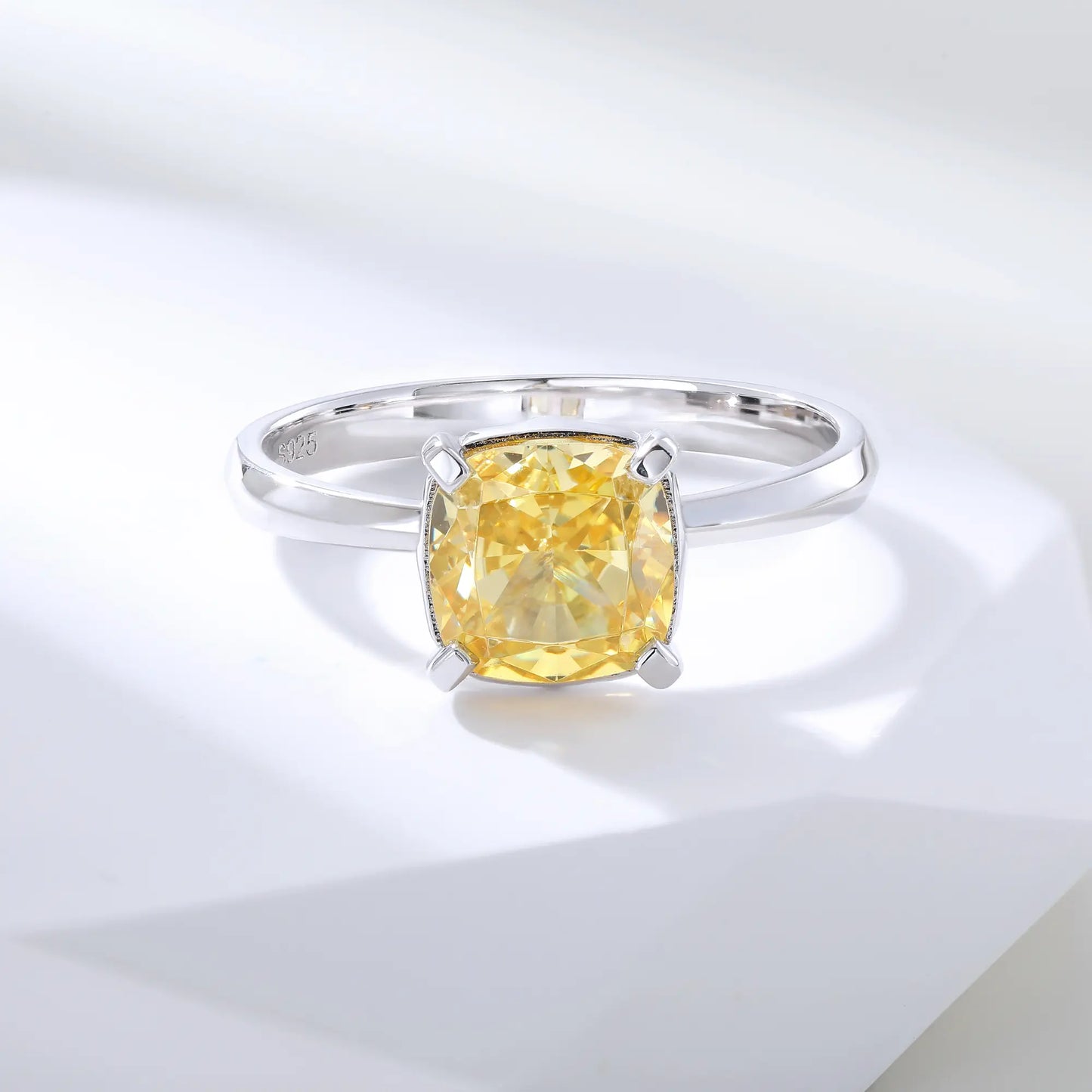 S925 sterling silver solitaire ring featuring a vibrant square cushion-cut yellow moissanite center stone on a classic polished band.