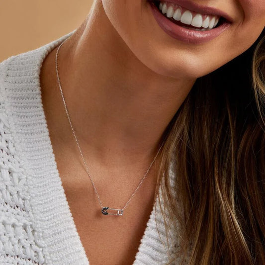 What Does a Safety Pin Necklace Mean? A Symbol of Strength, Protection, and Style