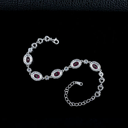 Silver and ruby bracelet with a lab grown ruby