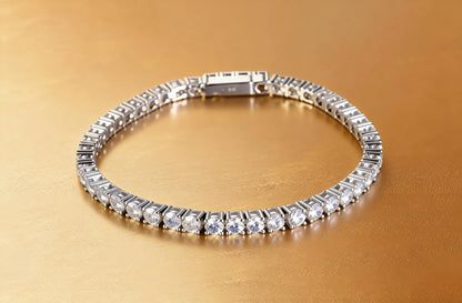 S925 sterling silver tennis bracelet featuring a continuous line of 2.0mm round brilliant white moissanite gemstones with a secure box clasp.