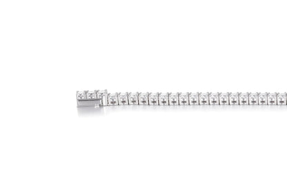 S925 sterling silver tennis bracelet featuring a continuous line of 2.0mm round brilliant white moissanite gemstones with a secure box clasp.