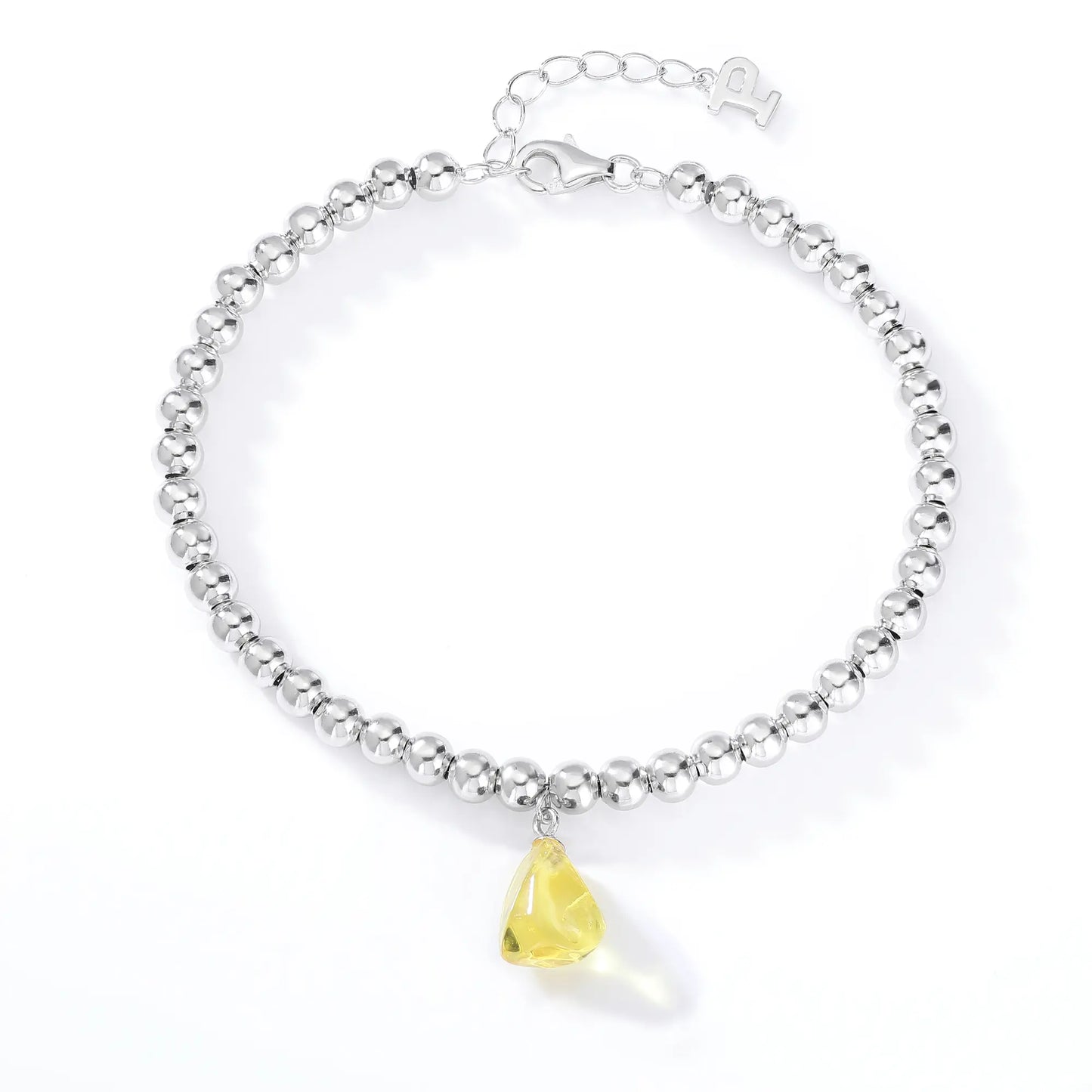 S925 sterling silver beaded bracelet featuring polished round silver beads and a translucent yellow sapphire freeform pendant charm.