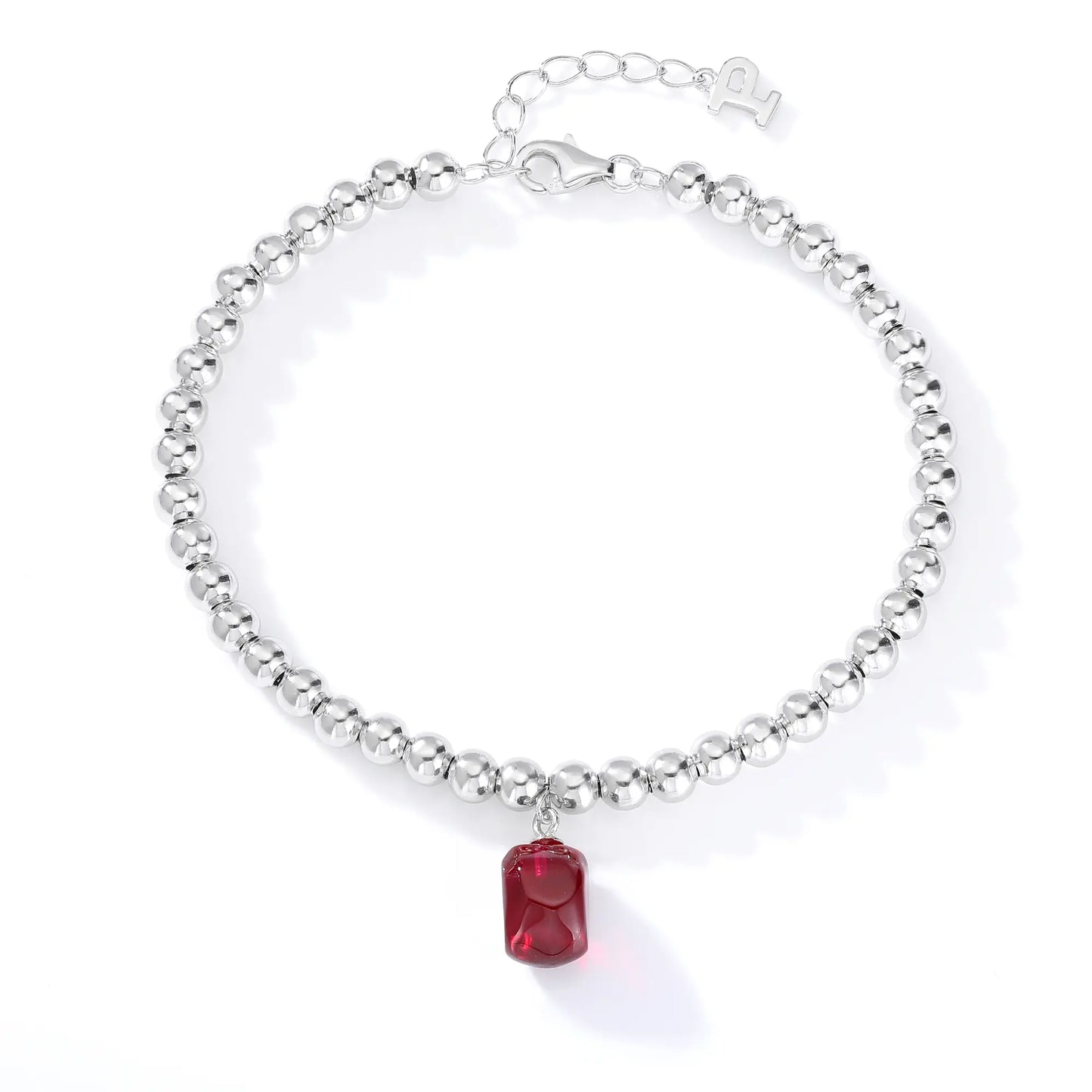 S925 sterling silver beaded bracelet featuring polished round silver beads and a vivid red ruby barrel-cut pendant charm.