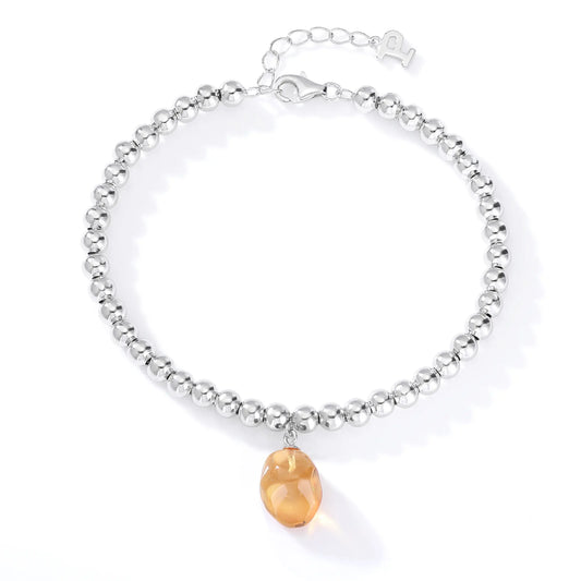 S925 sterling silver beaded bracelet featuring polished round silver beads and a warm champagne sapphire freeform pendant charm.