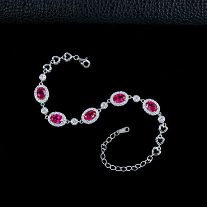 Silver and ruby bracelet with a lab grown ruby