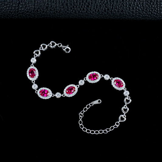 Silver and ruby bracelet with a lab grown ruby
