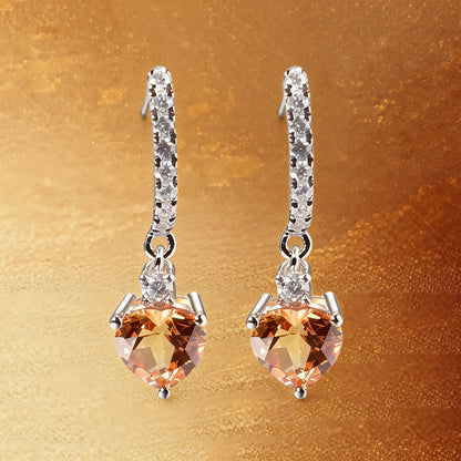 Elegantly crafted heart-shaped yellow sapphire dangle earrings in 925 sterling silver, sparkling brighter than classic moissanite earrings with micro-paved crystal hoops.