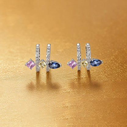 S925 sterling silver double row huggie hoop earrings featuring three geometric gemstones—a blue pear-cut, yellow round-cut, and purple princess-cut stone—with sparkling micro-pavé accents, creating a multi-piercing illusion.