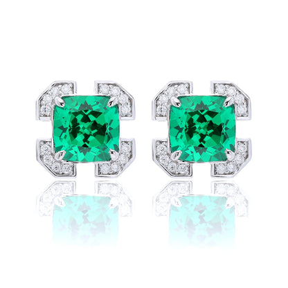 S925 sterling silver geometric stud earrings featuring a square cushion-cut vibrant green lab-grown emerald surrounded by an octagonal frame with pavé CZ accents.
