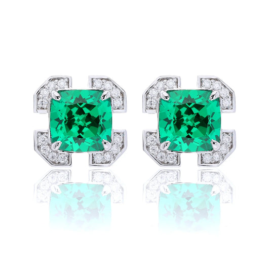 S925 sterling silver geometric stud earrings featuring a square cushion-cut vibrant green lab-grown emerald surrounded by an octagonal frame with pavé moissanite accents.