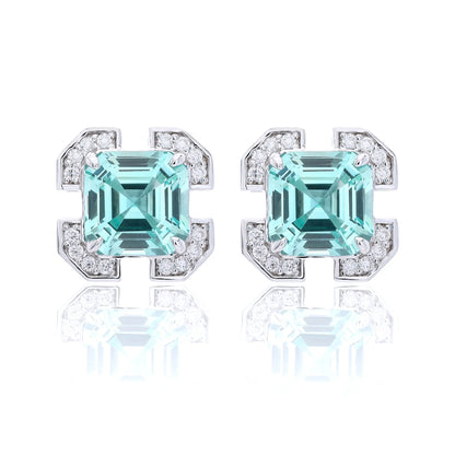 S925 sterling silver geometric stud earrings featuring a square Asscher-cut mint green spinel surrounded by an octagonal frame with pavé moissanite accents.