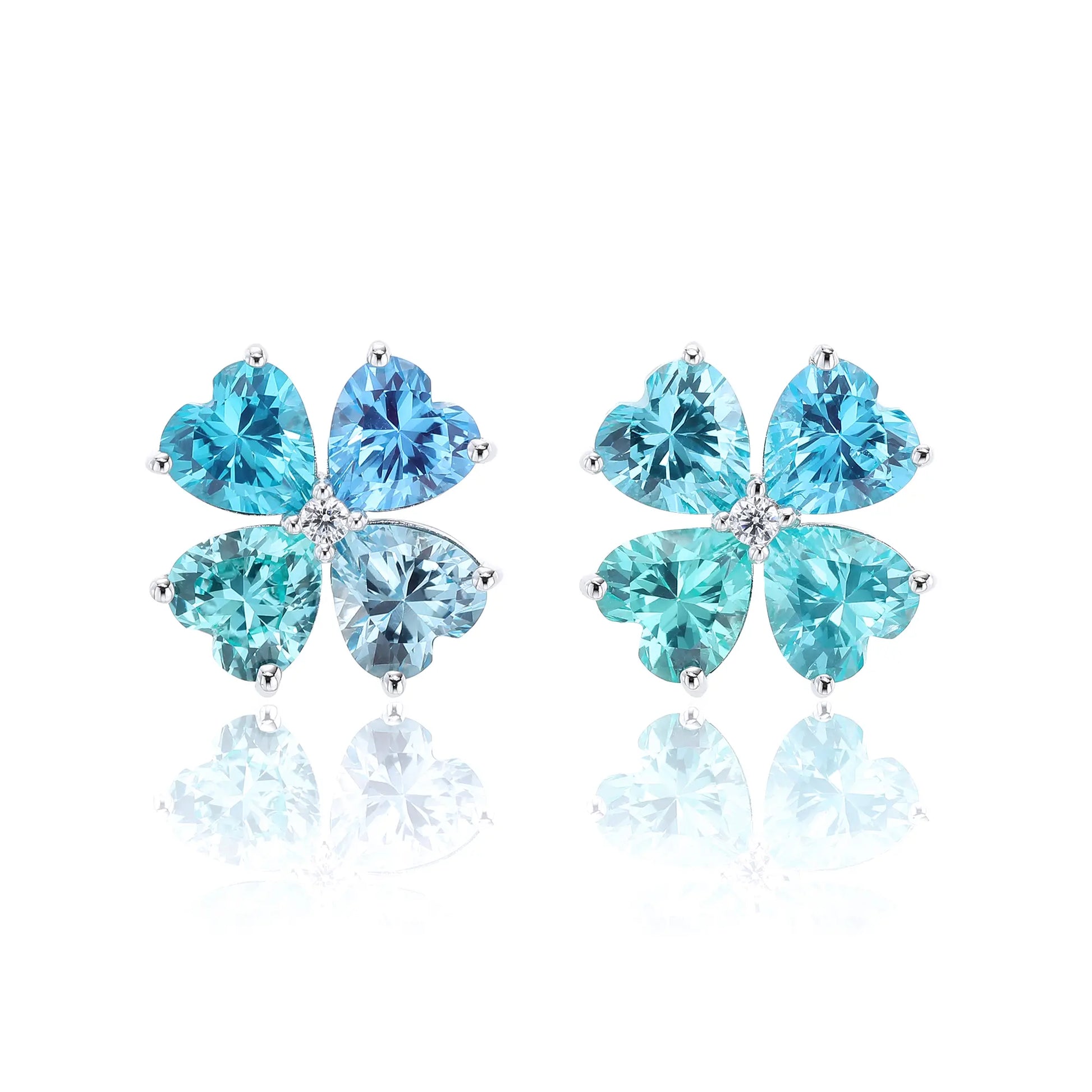 S925 sterling silver stud earrings featuring four heart-cut ocean blue moissanite gemstones forming a lucky four-leaf clover with a sparkling center moissanite.