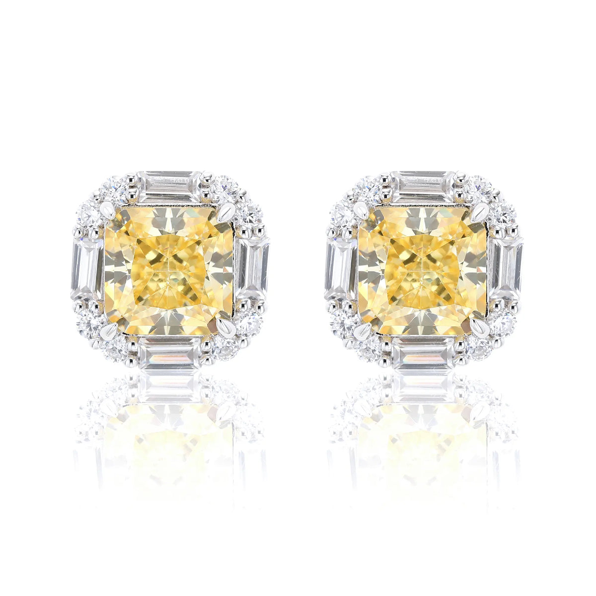 Cushion crushed ice cut canary yellow moissanite stud earrings featuring baguette and round moissanite halo setting.