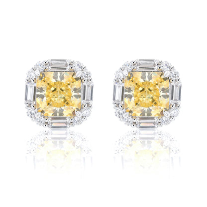 Cushion crushed ice cut canary yellow moissanite stud earrings featuring baguette and round moissanite halo setting.