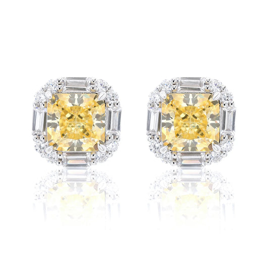Cushion crushed ice cut canary yellow moissanite stud earrings featuring baguette and round moissanite halo setting.
