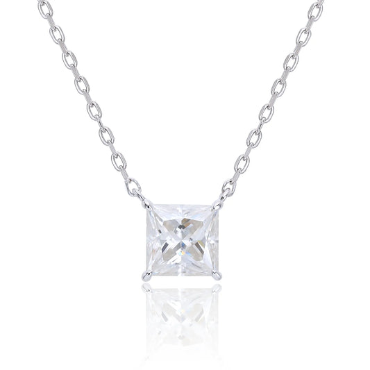 A sparkling princess cut moissanite solitaire pendant necklace in a classic sterling silver four-prong setting, showcasing intense fire and a white reflective surface.