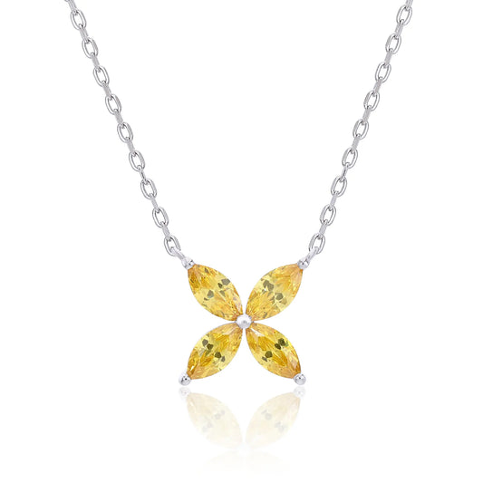 A sterling silver chain necklace featuring a classic minimalist four-leaf clover flower pendant crafted with four brilliant marquise-cut yellow moissanite gemstones.