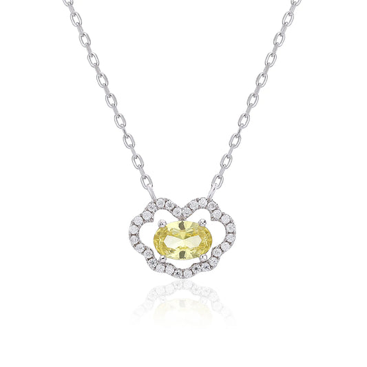 A sterling silver chain necklace featuring a traditional Chinese auspicious Ruyi cloud pendant, encrusted with shimmering pavé accents and centered with an oval-cut yellow moissanite gemstone.