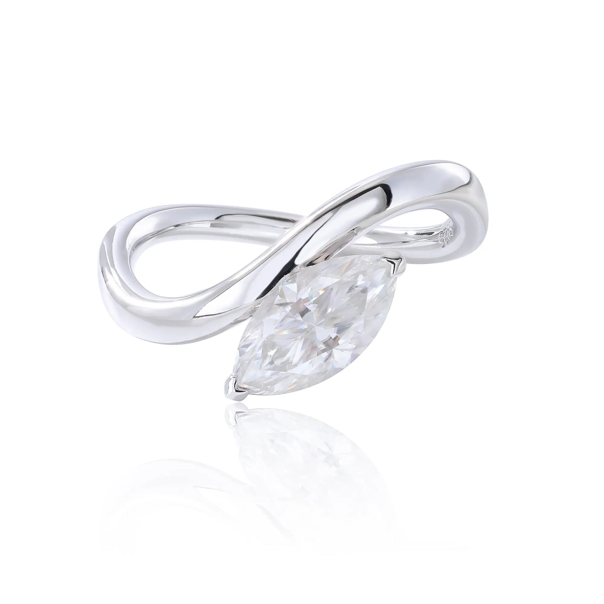 A sterling silver solitaire ring featuring a brilliant marquise-cut white moissanite stone, nestled within a modern fluid bypass twisted wave band.