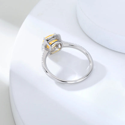 S925 sterling silver ring featuring a square cushion-cut yellow moissanite center stone surrounded by a sparkling moissanite halo and pavé band.
