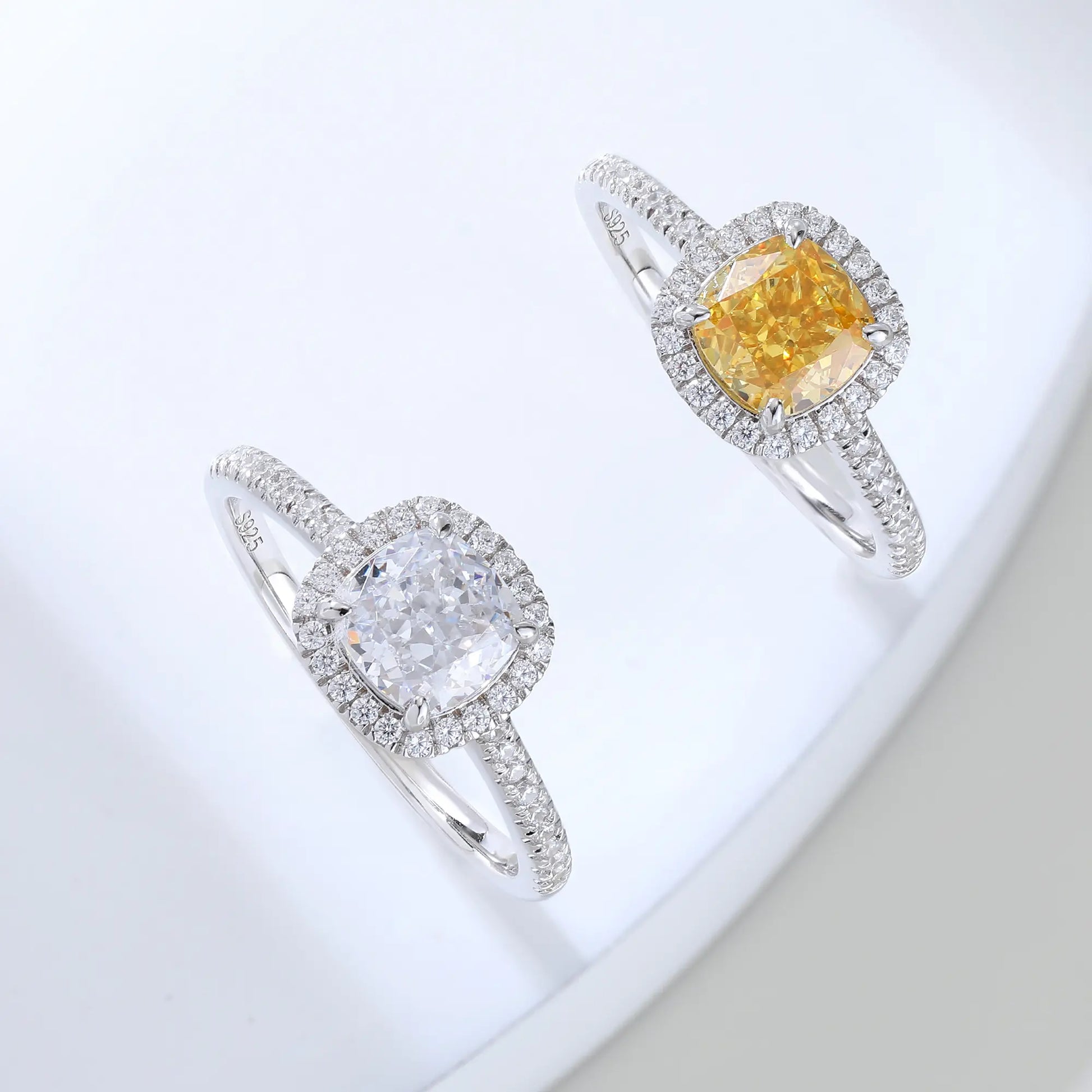 S925 sterling silver ring featuring a square cushion-cut yellow moissanite center stone surrounded by a sparkling moissanite halo and pavé band.