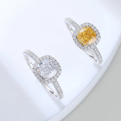 S925 sterling silver ring featuring a square cushion-cut yellow moissanite center stone surrounded by a sparkling moissanite halo and pavé band.