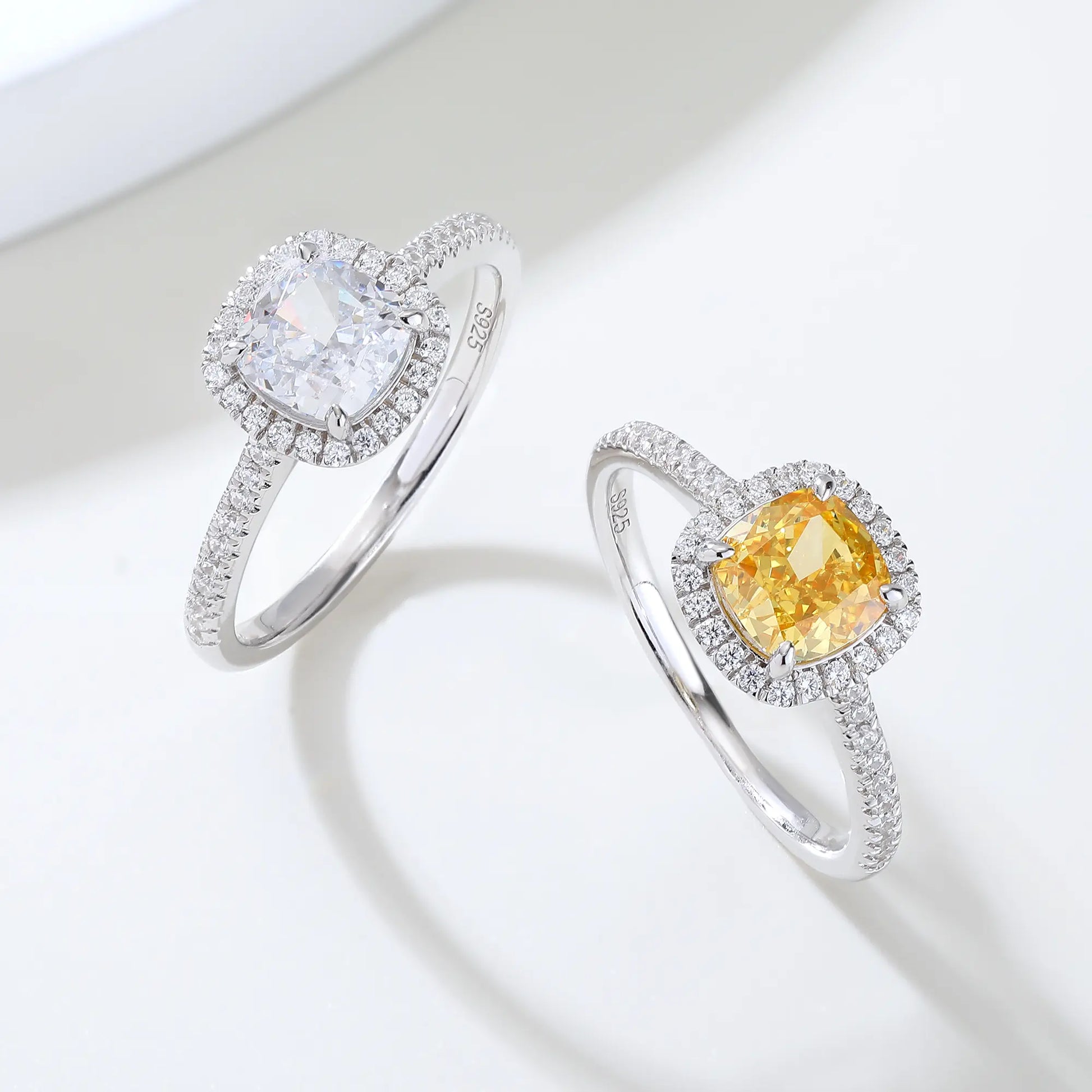 S925 sterling silver ring featuring a square cushion-cut yellow moissanite center stone surrounded by a sparkling moissanite halo and pavé band.