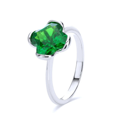 S925 sterling silver ring featuring a single clover-cut vibrant green lab-grown emerald set in a sleek bezel mounting.