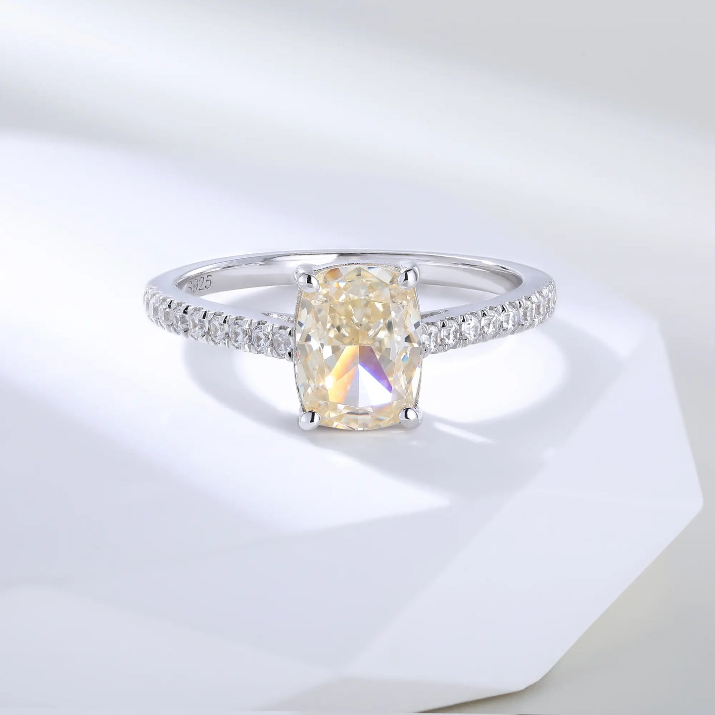 S925 sterling silver ring featuring a warm champagne elongated cushion-cut moissanite center stone on a brilliant sparkling moissanite wedding band.