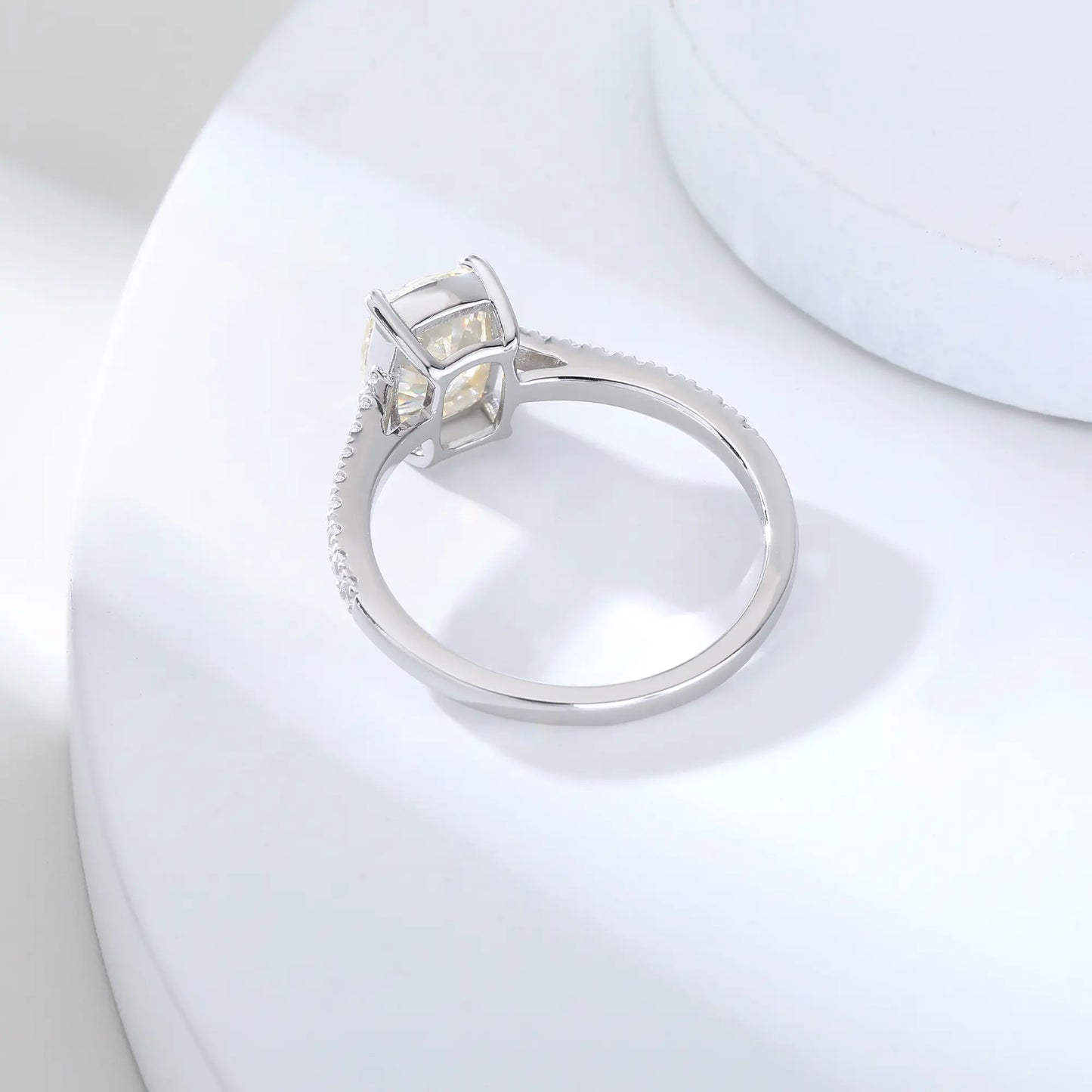 S925 sterling silver ring featuring a warm champagne elongated cushion-cut moissanite center stone on a brilliant sparkling moissanite wedding band.