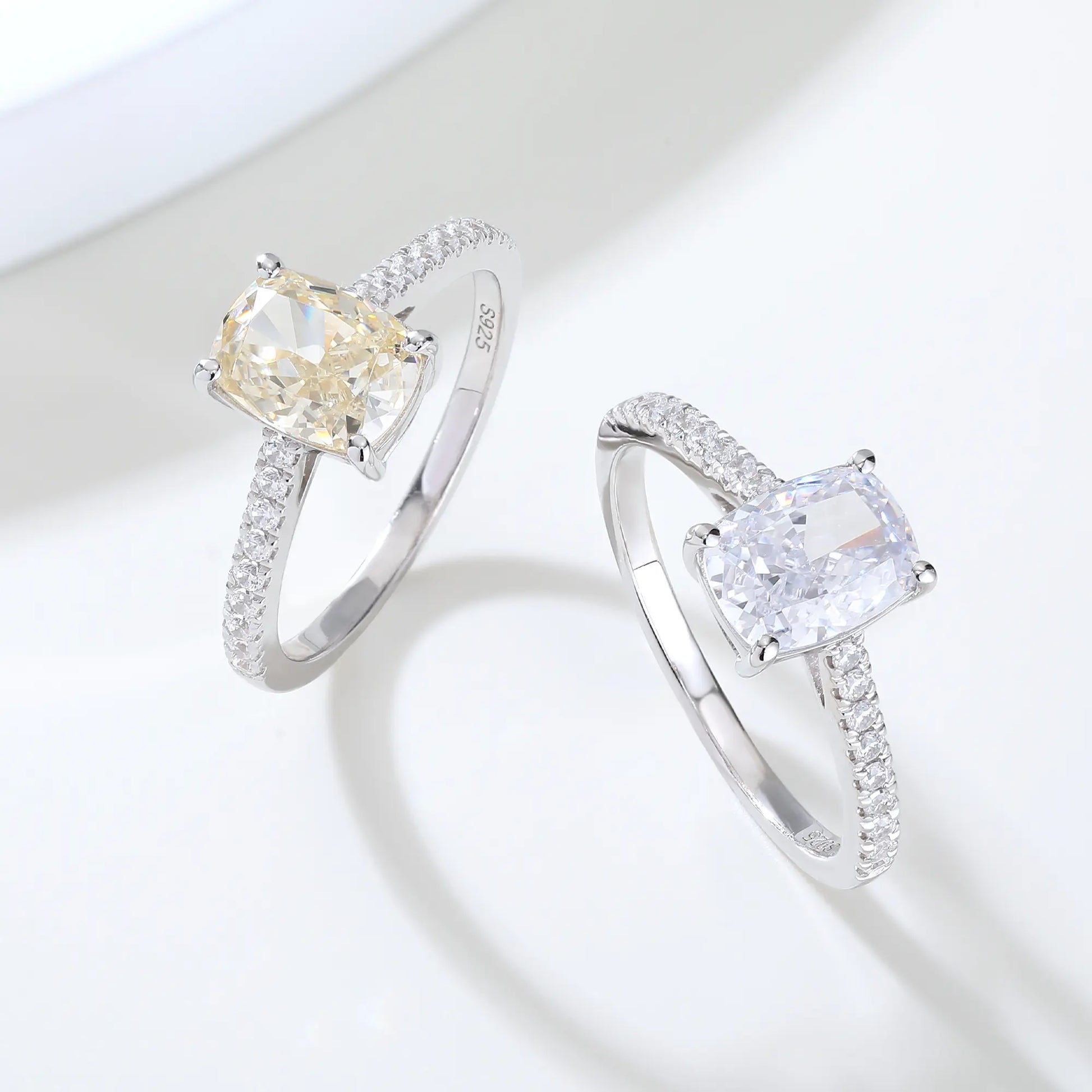 S925 sterling silver ring featuring a warm champagne elongated cushion-cut moissanite center stone on a brilliant sparkling moissanite wedding band.