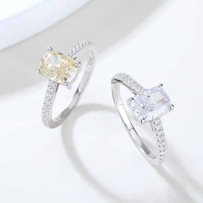 S925 sterling silver ring featuring a warm champagne elongated cushion-cut moissanite center stone on a brilliant sparkling moissanite wedding band.