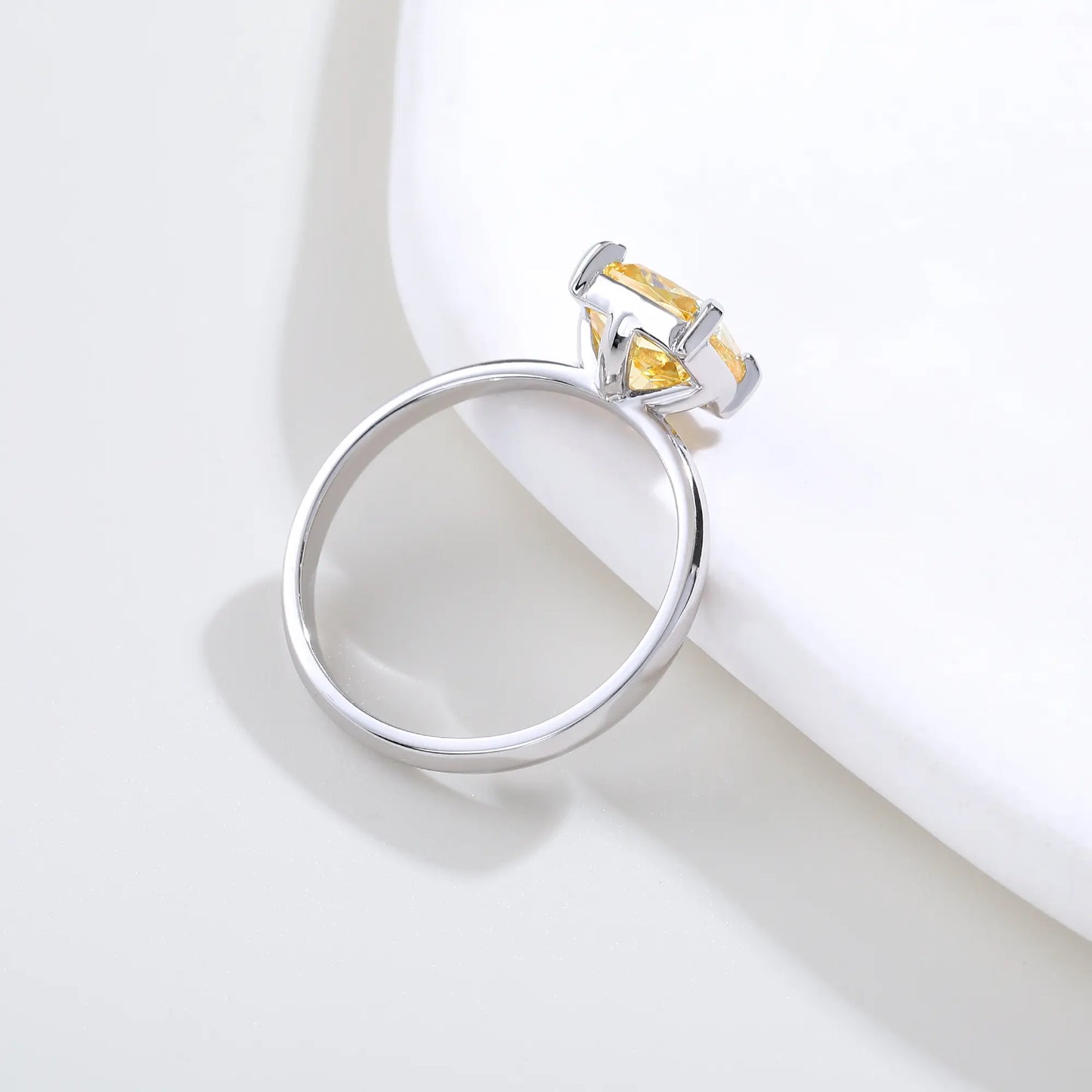 S925 sterling silver solitaire ring featuring a vibrant square cushion-cut yellow moissanite center stone on a classic polished band.