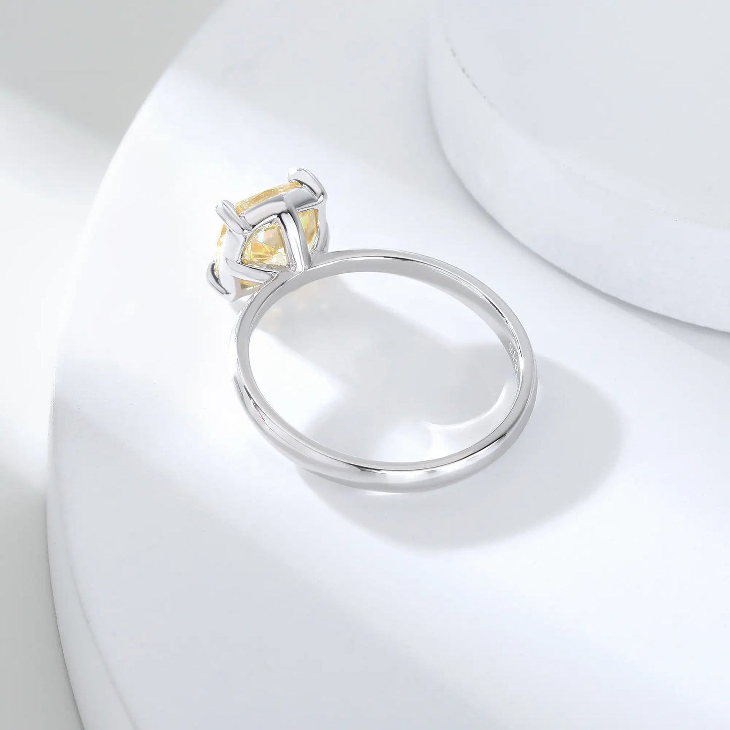 S925 sterling silver solitaire ring featuring a vibrant square cushion-cut yellow moissanite center stone on a classic polished band.