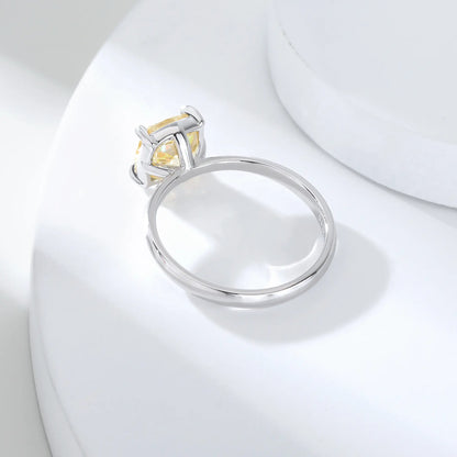 S925 sterling silver solitaire ring featuring a vibrant square cushion-cut yellow moissanite center stone on a classic polished band.