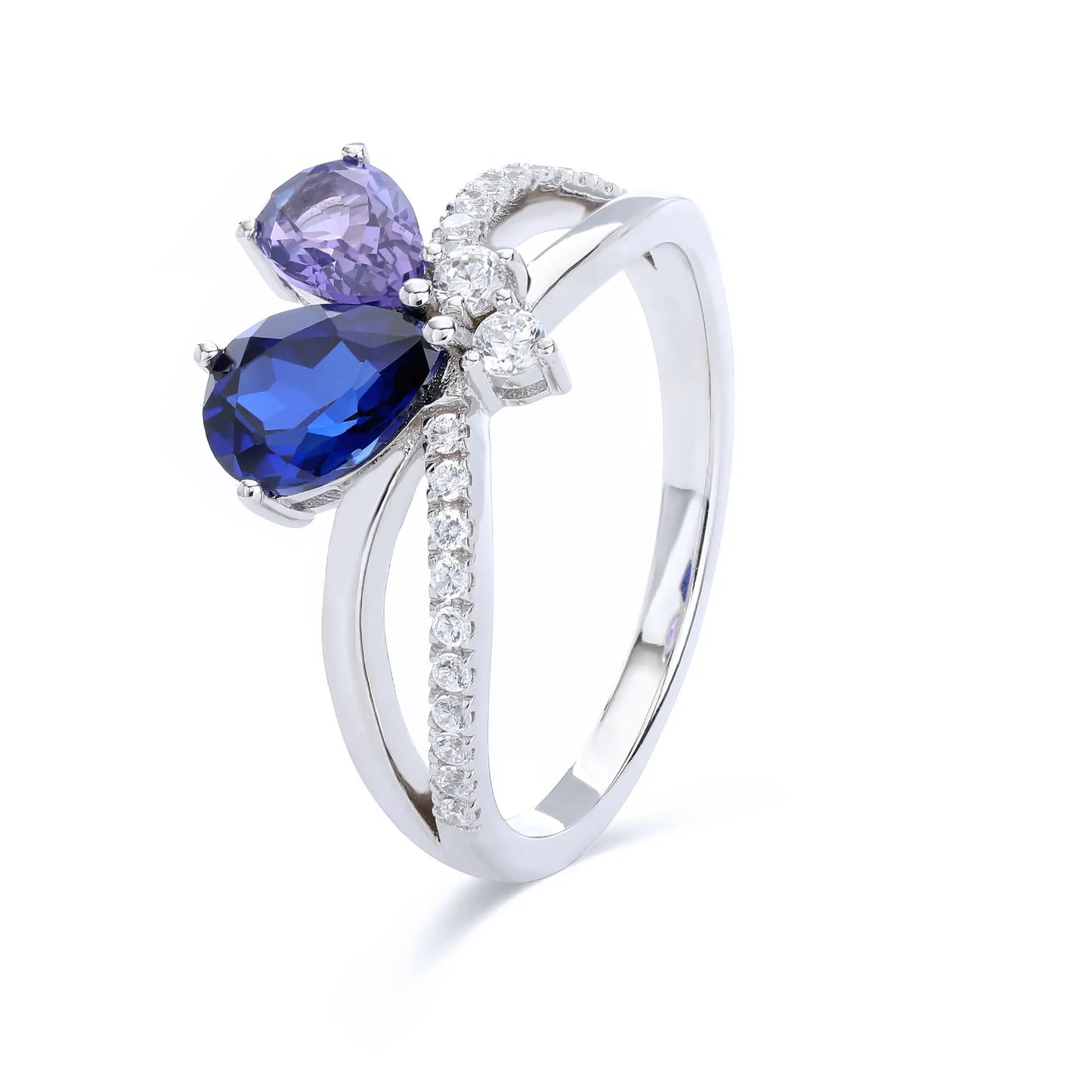 S925 sterling silver criss-cross ring with pear-cut royal blue and lavender sapphires forming a butterfly with a sparkling accent at the center.