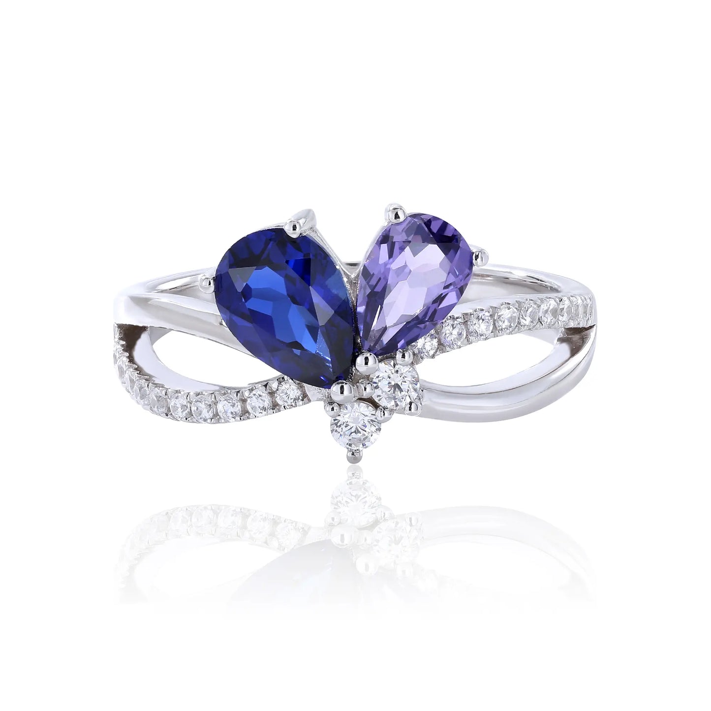 S925 sterling silver criss-cross ring with pear-cut royal blue and lavender sapphires forming a butterfly with a sparkling accent at the center.
