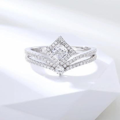 S925 sterling silver tiara ring featuring a square cushion-cut moissanite center stone set in a diamond-shaped halo on a curved double-row pavé crown band.