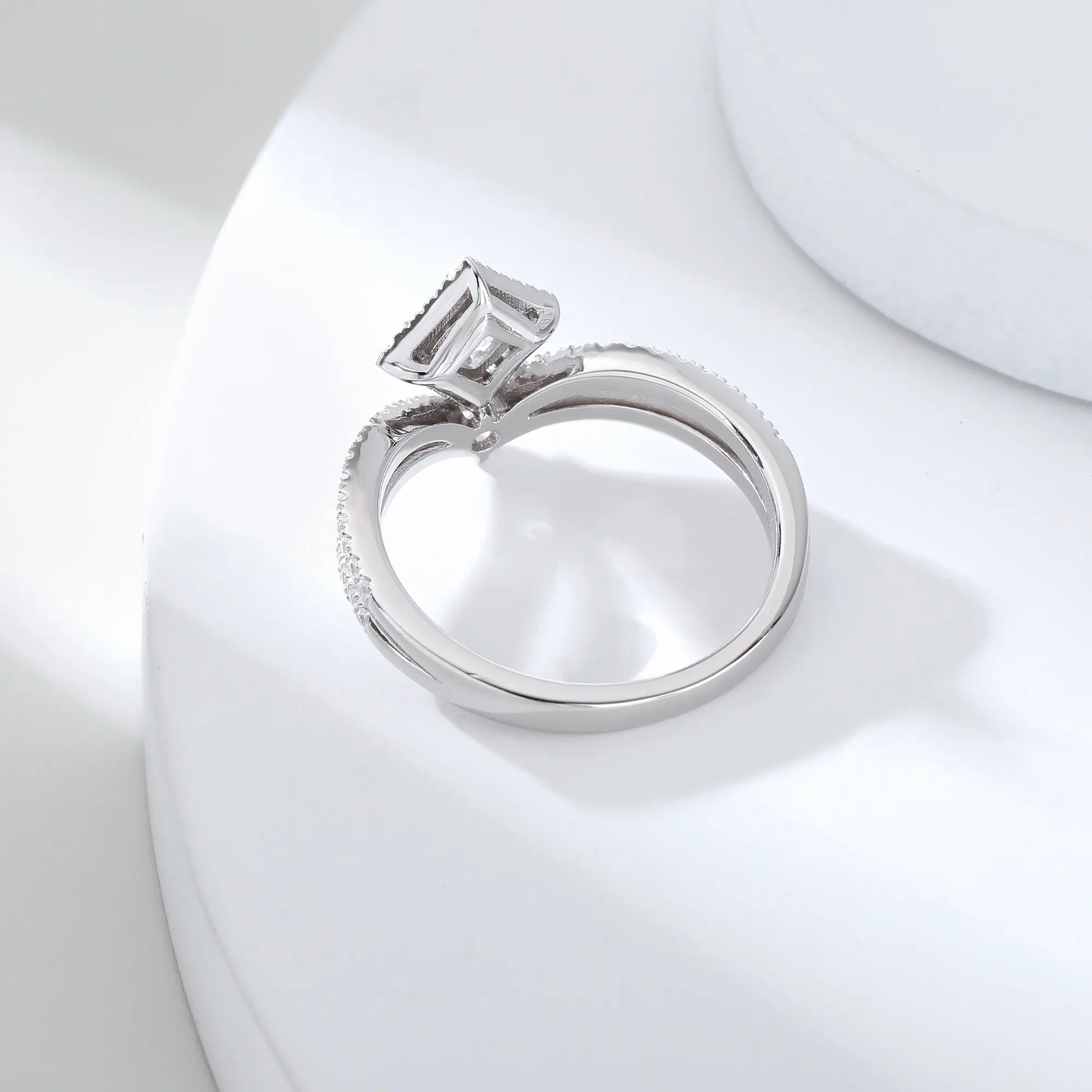 S925 sterling silver tiara ring featuring a square cushion-cut moissanite center stone set in a diamond-shaped halo on a curved double-row pavé crown band.