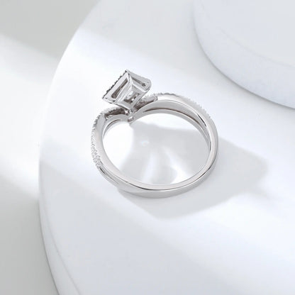 S925 sterling silver tiara ring featuring a square cushion-cut moissanite center stone set in a diamond-shaped halo on a curved double-row pavé crown band.