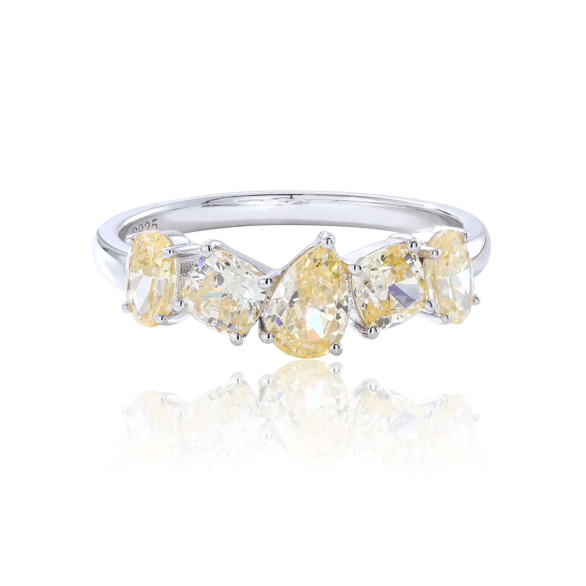 S925 sterling silver five-stone ring featuring fancy multi-shape yellow moissanites including pear, cushion, and oval cuts in a contour band.