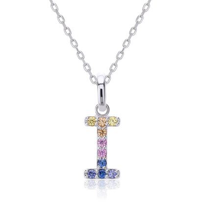 A sleek sterling silver initial necklace showcasing a capital letter I pendant set with a precise vertical rainbow gradient of multi-color lab sapphires.