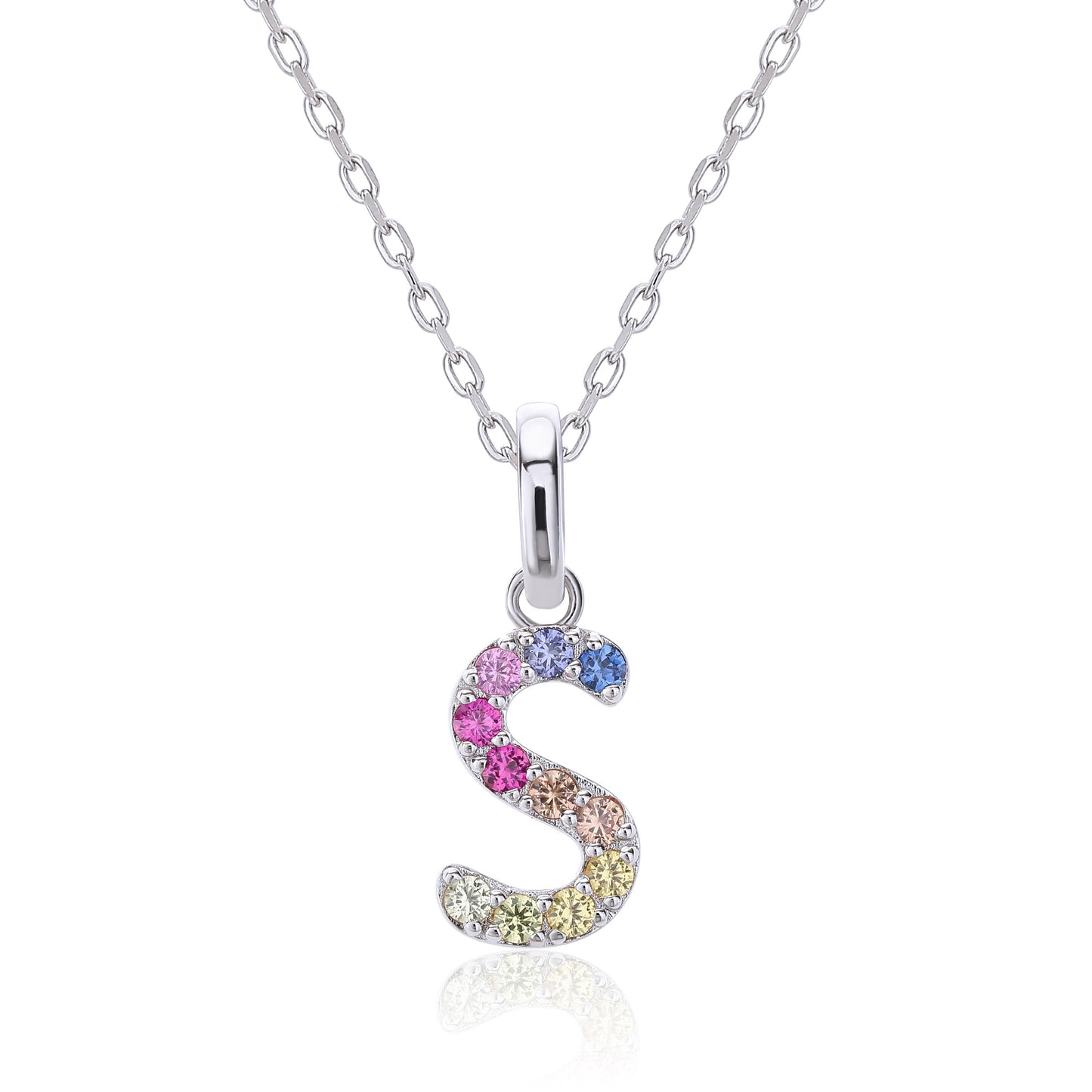 A delicate sterling silver initial necklace showcasing a fluid, serpentine letter S pendant precision-set with a continuous rainbow wave of vibrant round lab sapphires.