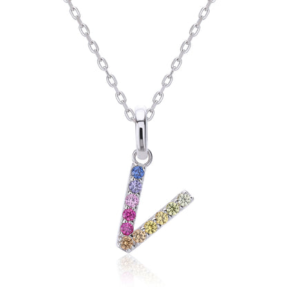 A delicate sterling silver cable chain necklace showcasing an architectural capital letter V pendant precision-set with a dynamic rainbow gradient of multi-color lab sapphires.